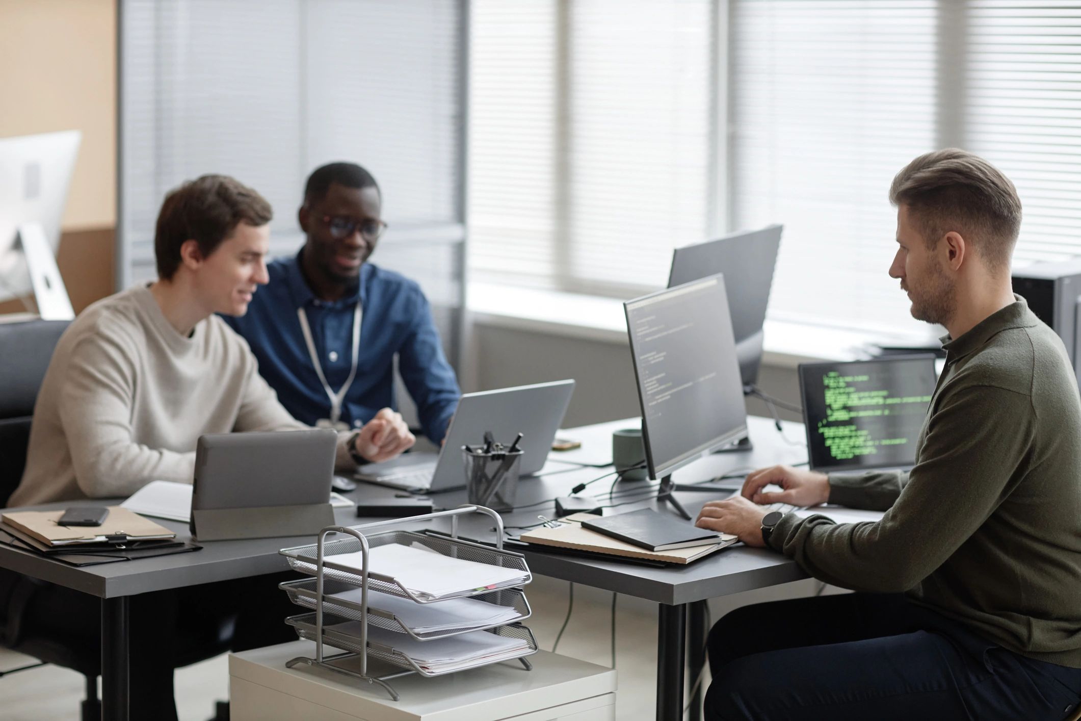 Software professionals working together in an office